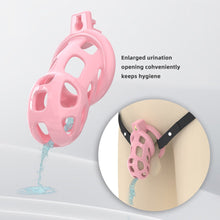Load image into Gallery viewer, Pink Silicone Mamba Chastity Cage lock and ring details
